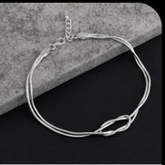 Infinity Knot Silver Rakhi